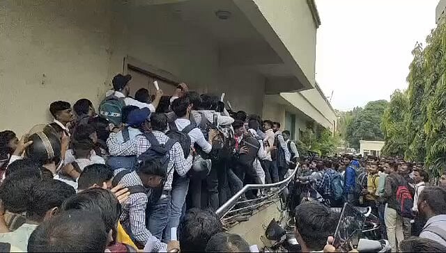 Job aspirants waiting in line for walk-in interview in Ankleshwar, Gujarat - null